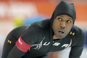 Shani Davis of the U.S. looks at his time after competing in the men's 1,000 meters speed skating race during the 2014 Sochi Winter Olympics